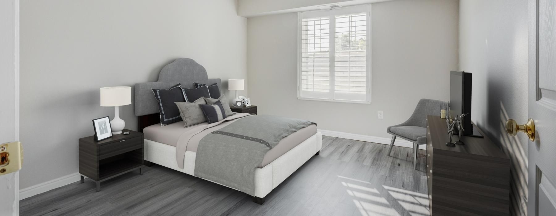 a living room with a couch and a fan
