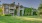 a large house with a lawn in front of it
