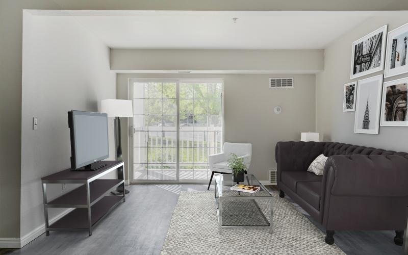 a living room with a couch and a tv
