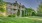 a large house with a lawn in front of it